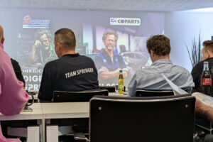 Blick von hinten ins Publikum und auf die Leinwand vorn beim COPARTS Digital Tag in Stuhr im Juni 2026